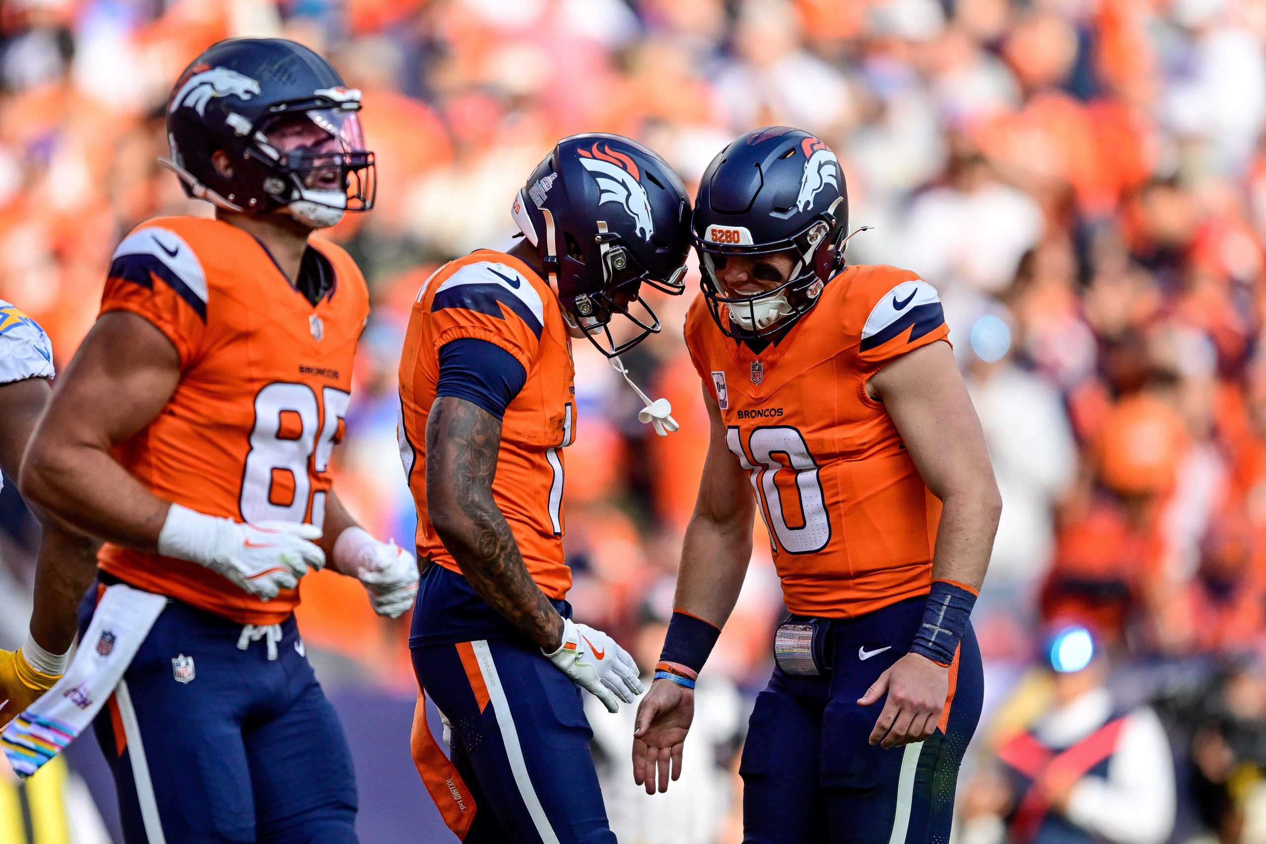 Troy Franklin and Bo Nix of the Denver Broncos celebrate