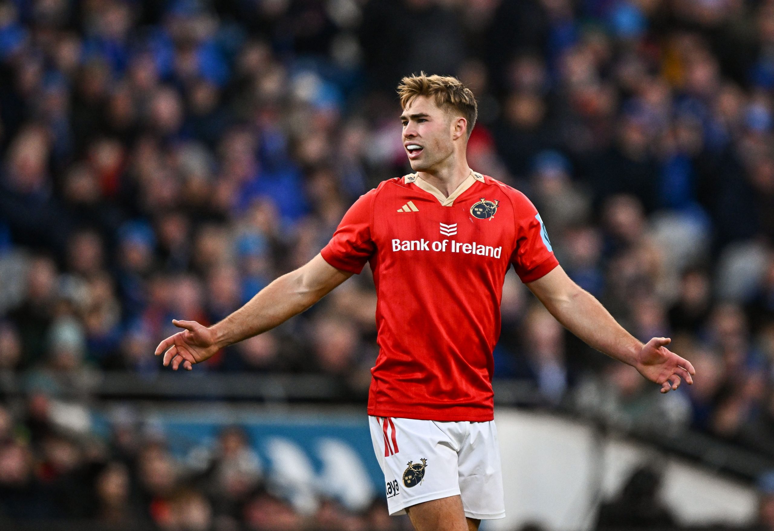 Jack Crowley of Munster reacts