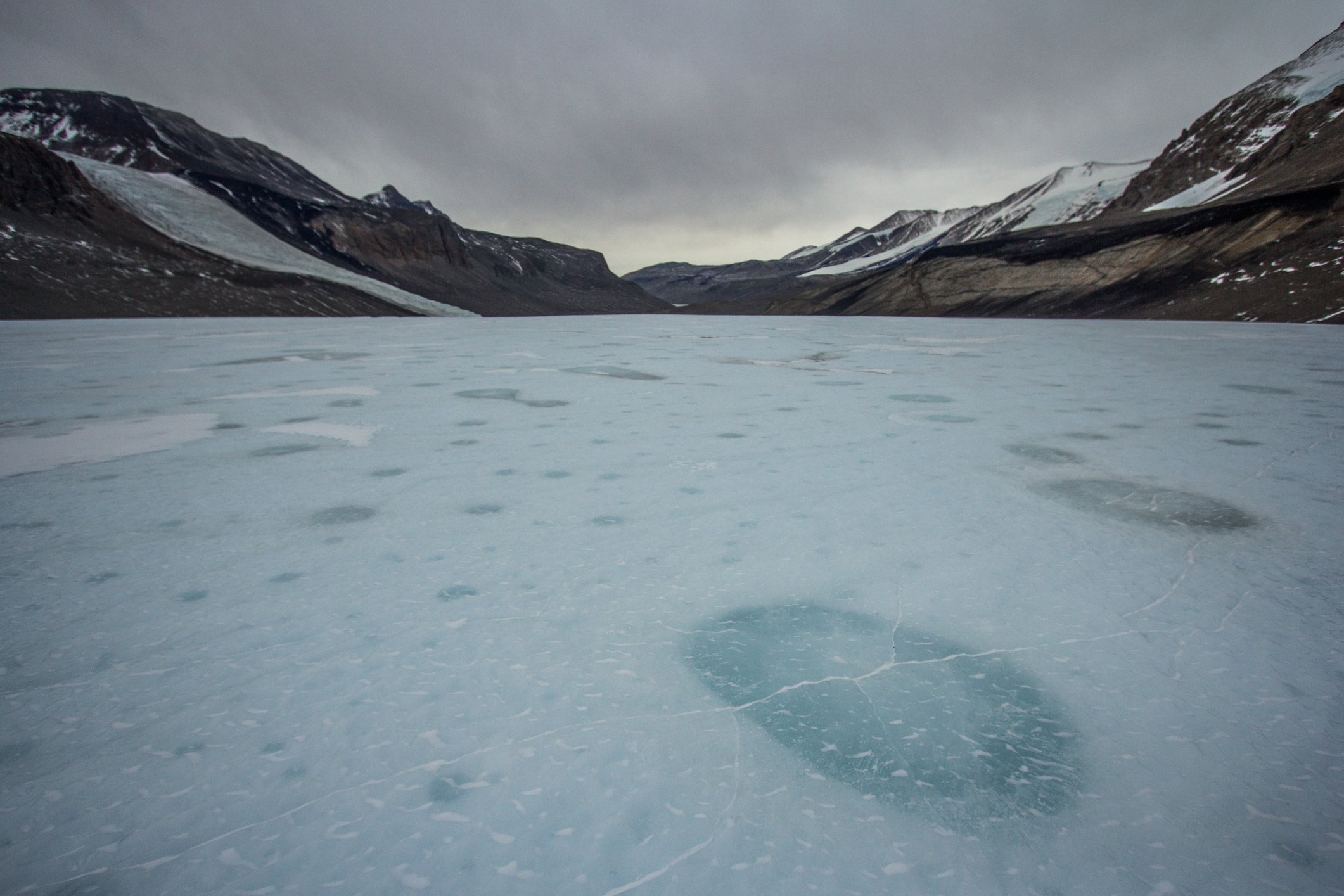 Cryoconites on a glacier on Earth