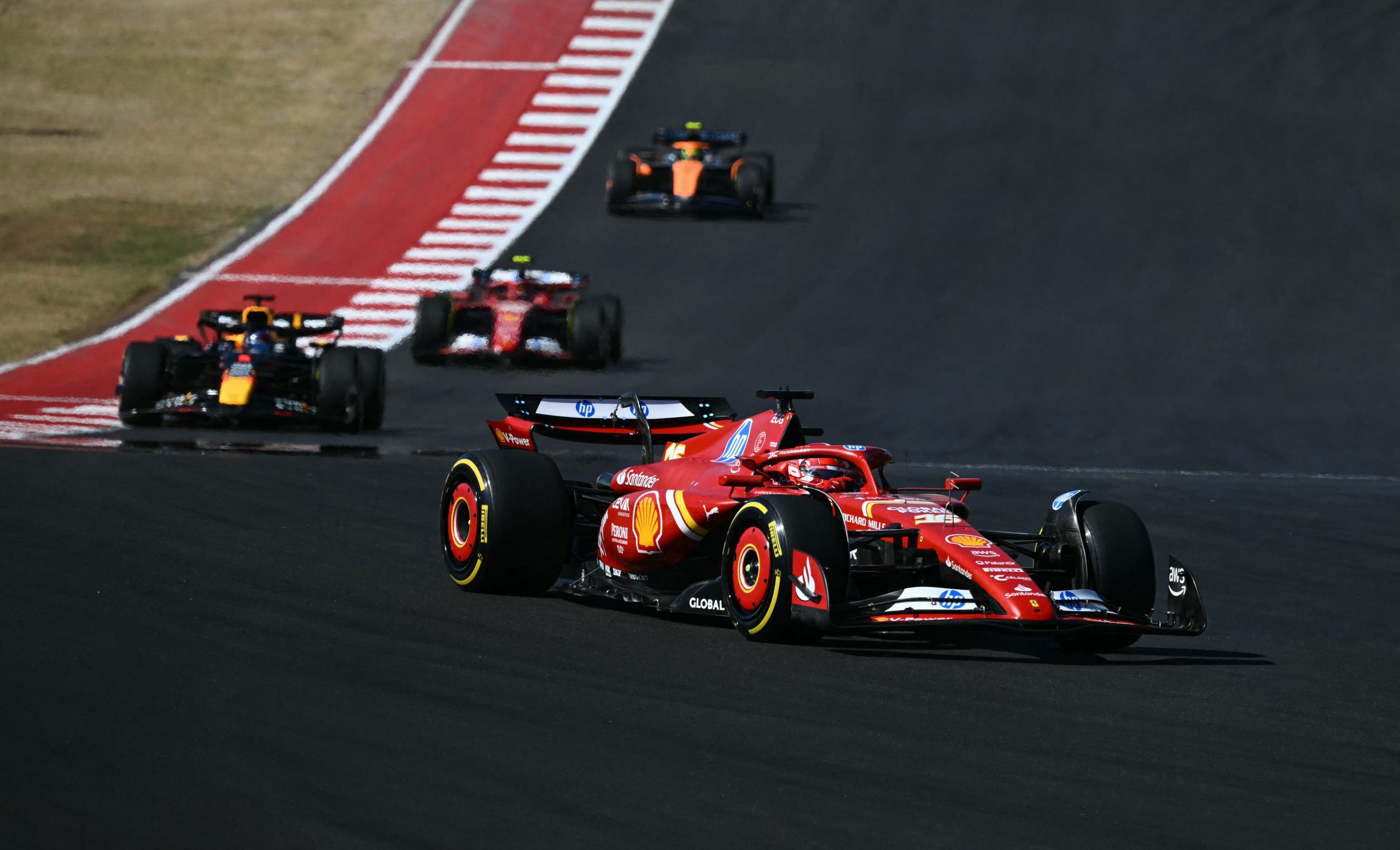 Ferrari's Monegasque driver Charles Leclerc takes the lead