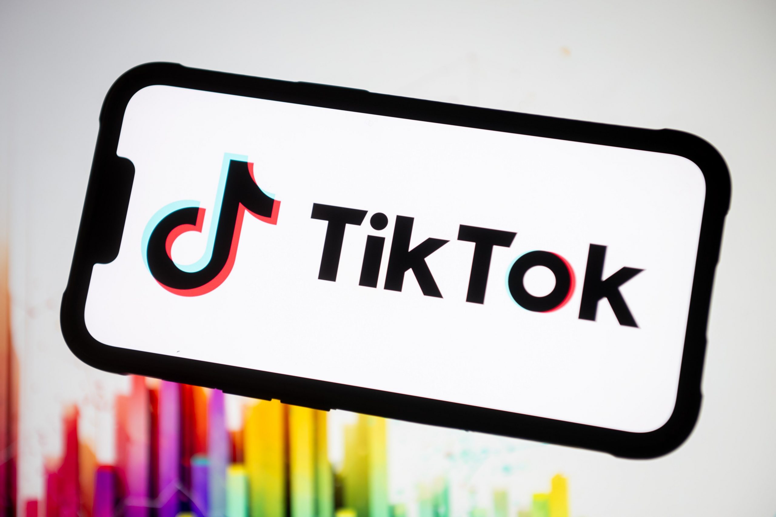 TikTok logo displayed on a phone screen. 