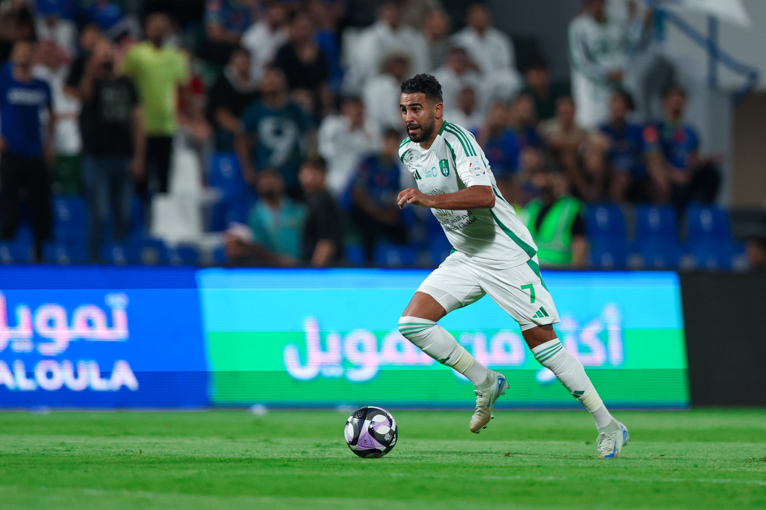 Riyad Mahrez of Al Ahli with the ball