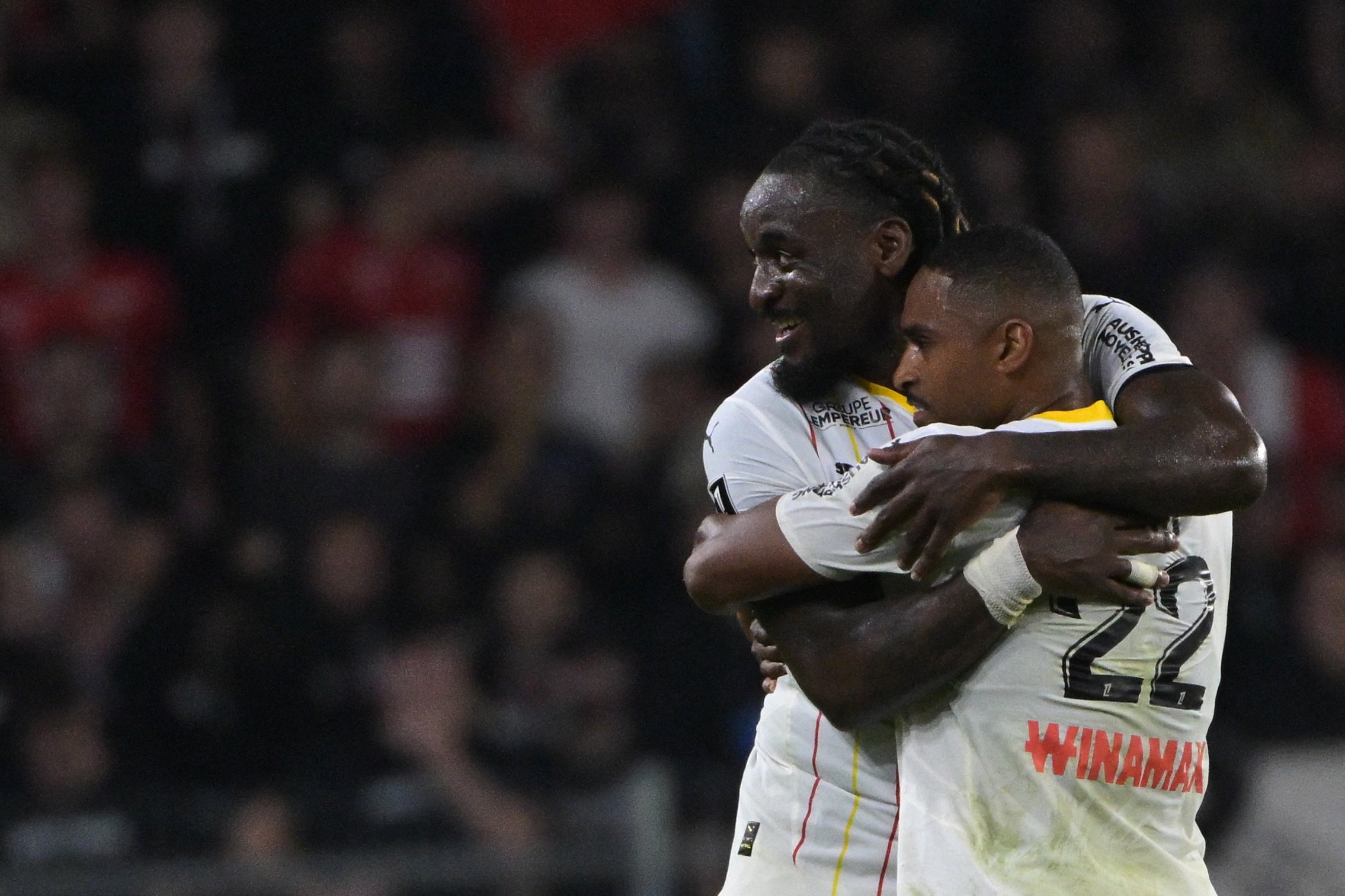 Lens' Angolan forward M'Bala Nzola celebrates with Lens' French forward Wesley Said