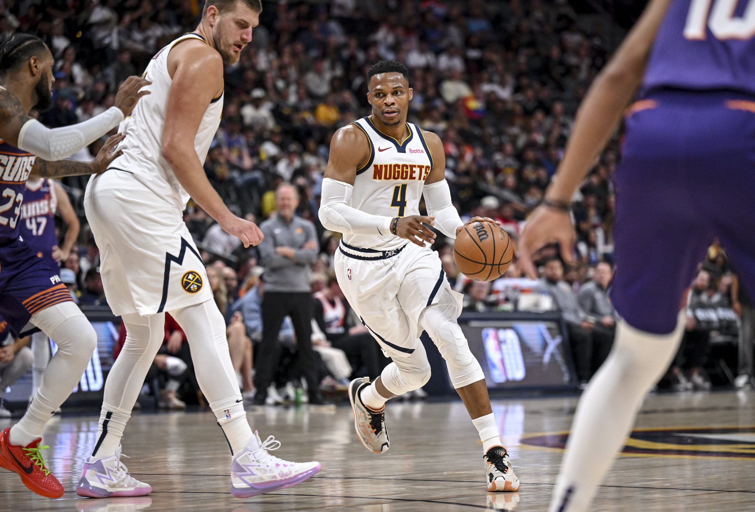 Russell Westbrook of the Denver Nuggets handles the ball