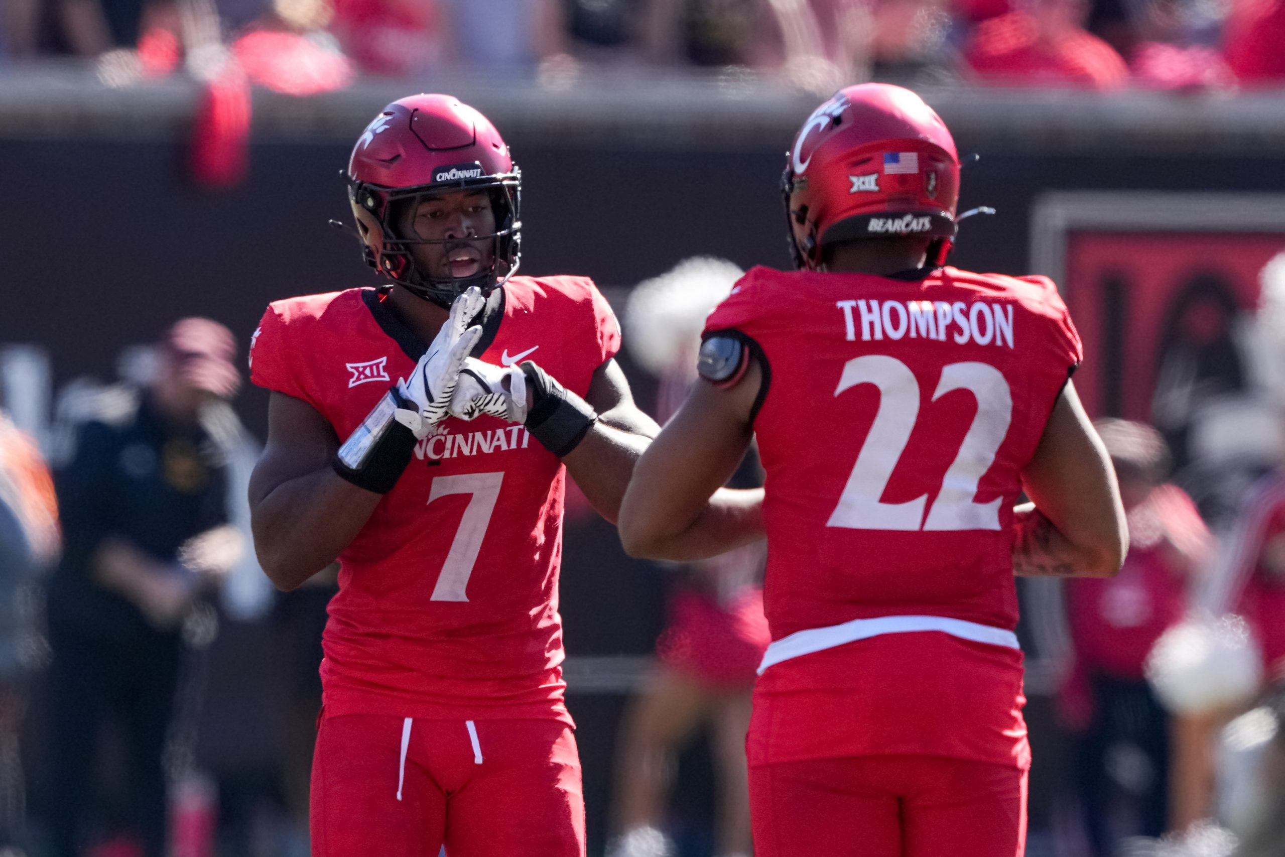 Jared Bartlett #7 and Jonathan Thompson #22 of the Cincinnati Bearcats