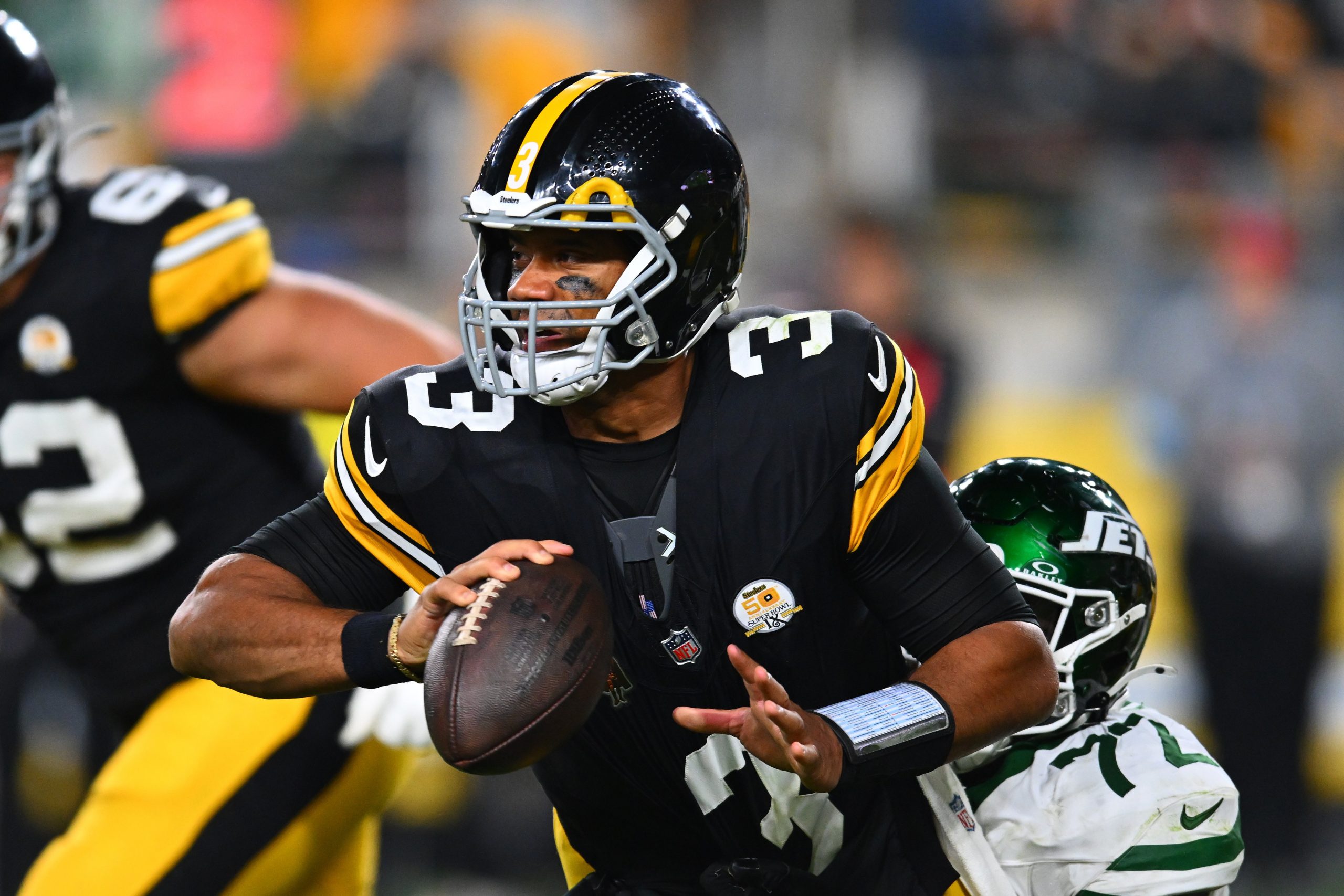 Russell Wilson of the Pittsburgh Steelers is tackled