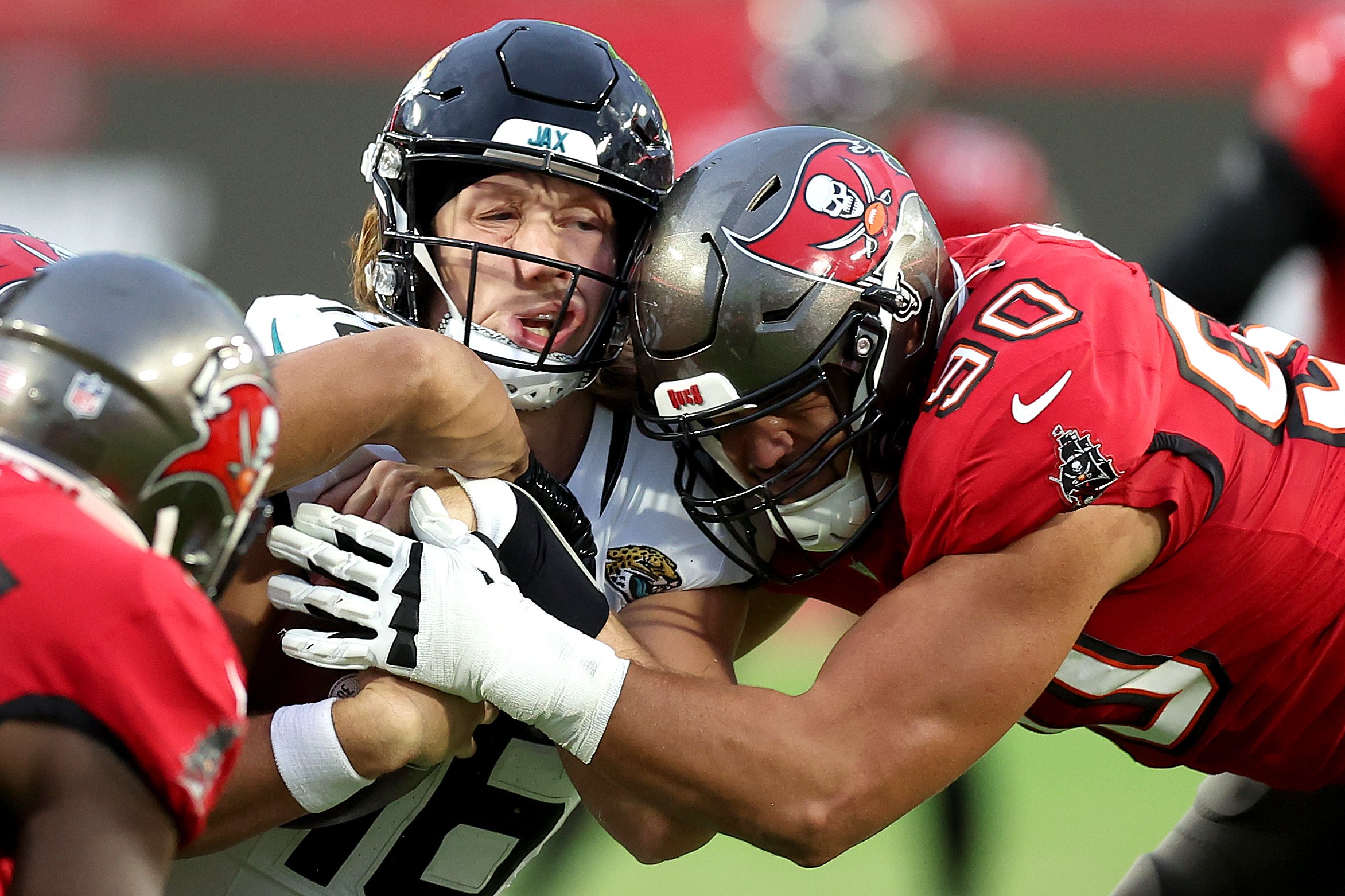 Logan Paul of the Tampa Bay Buccaneers charges in