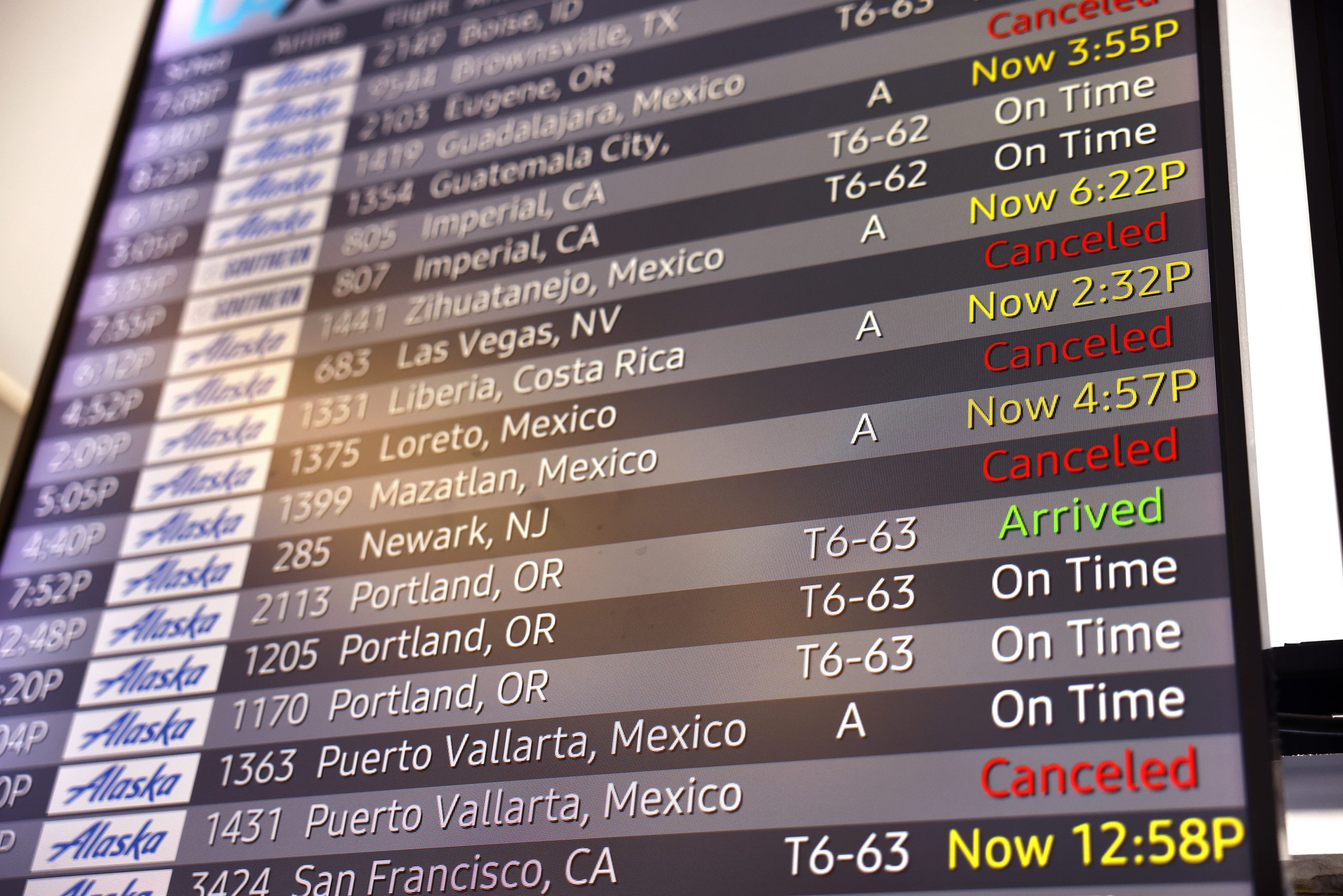 image of delayed and cancelled flights on board