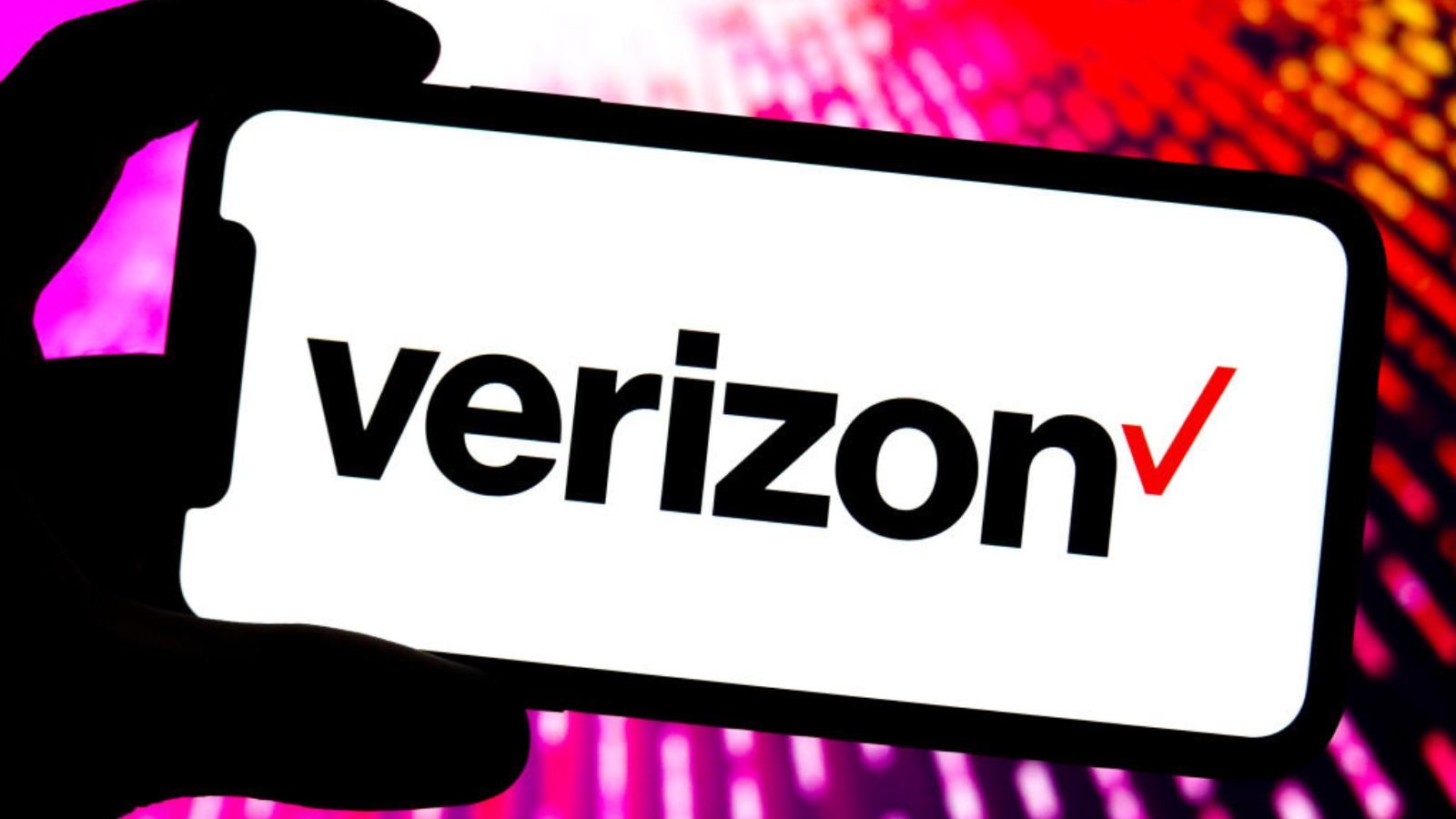 In this photo illustration, a Verizon logo is displayed on the screen of a smartphone.