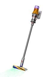 Dyson V12 Detect Slim cordless vacuum with green laser shining out of cleaning head