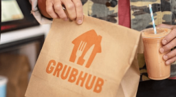 grubhub bag being held by a hand 