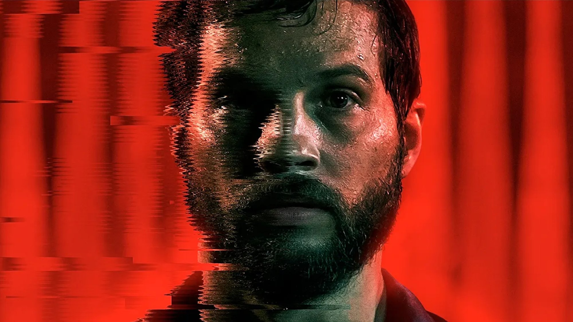 Logan Marshall-Green appears on a red background for the poster of "Upgrade"