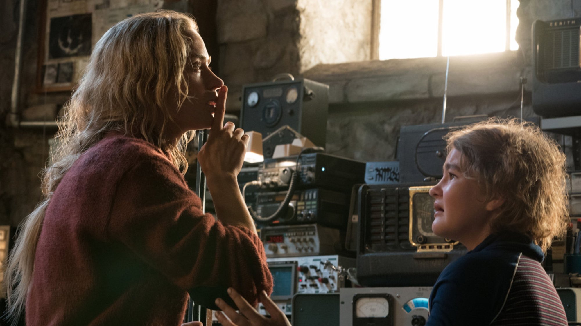 Emily Blunt raises a finger in silence in "A Quiet Place."