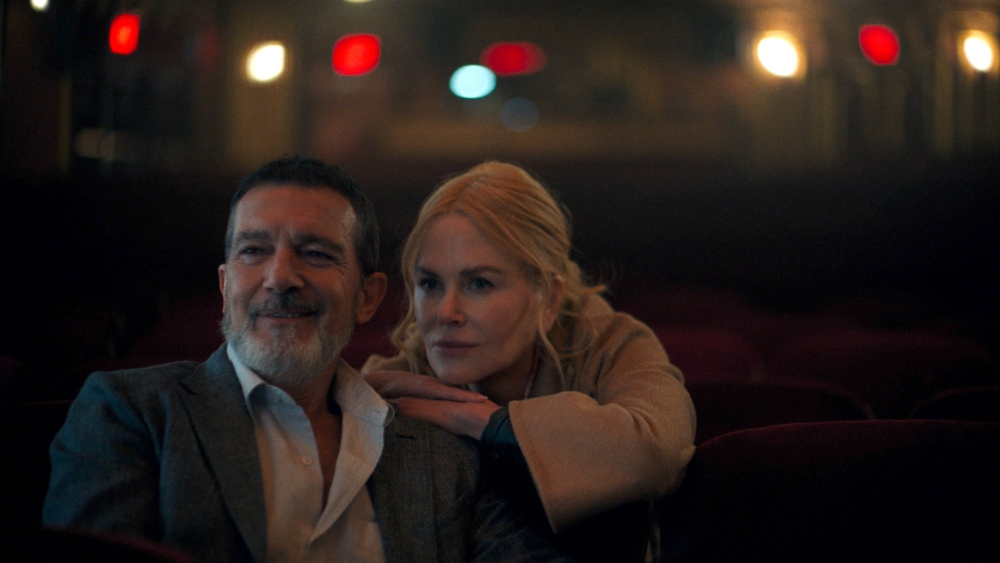 Antonio Banderas and Nicole Kidman sit together in the film "Babygirl."