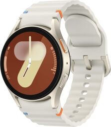 A Samsung Galaxy Watch 7 with a cream band