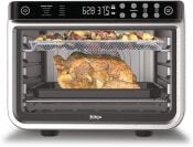 ninja foodi air fryer oven with chicken inside