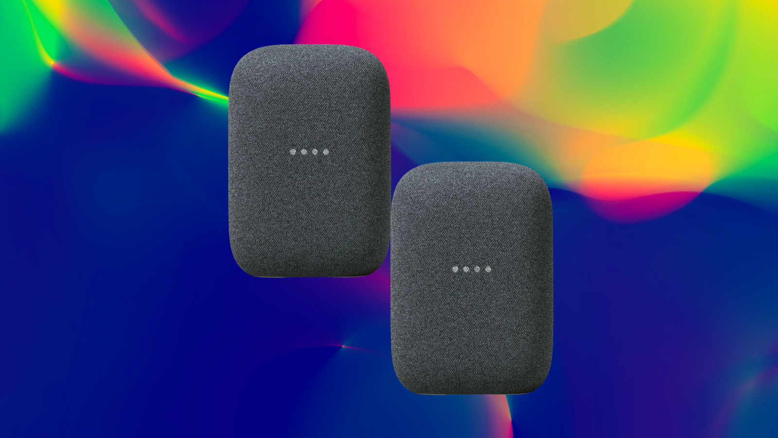 Two Google Nest Audio speakers on a multicolor watercolor background 