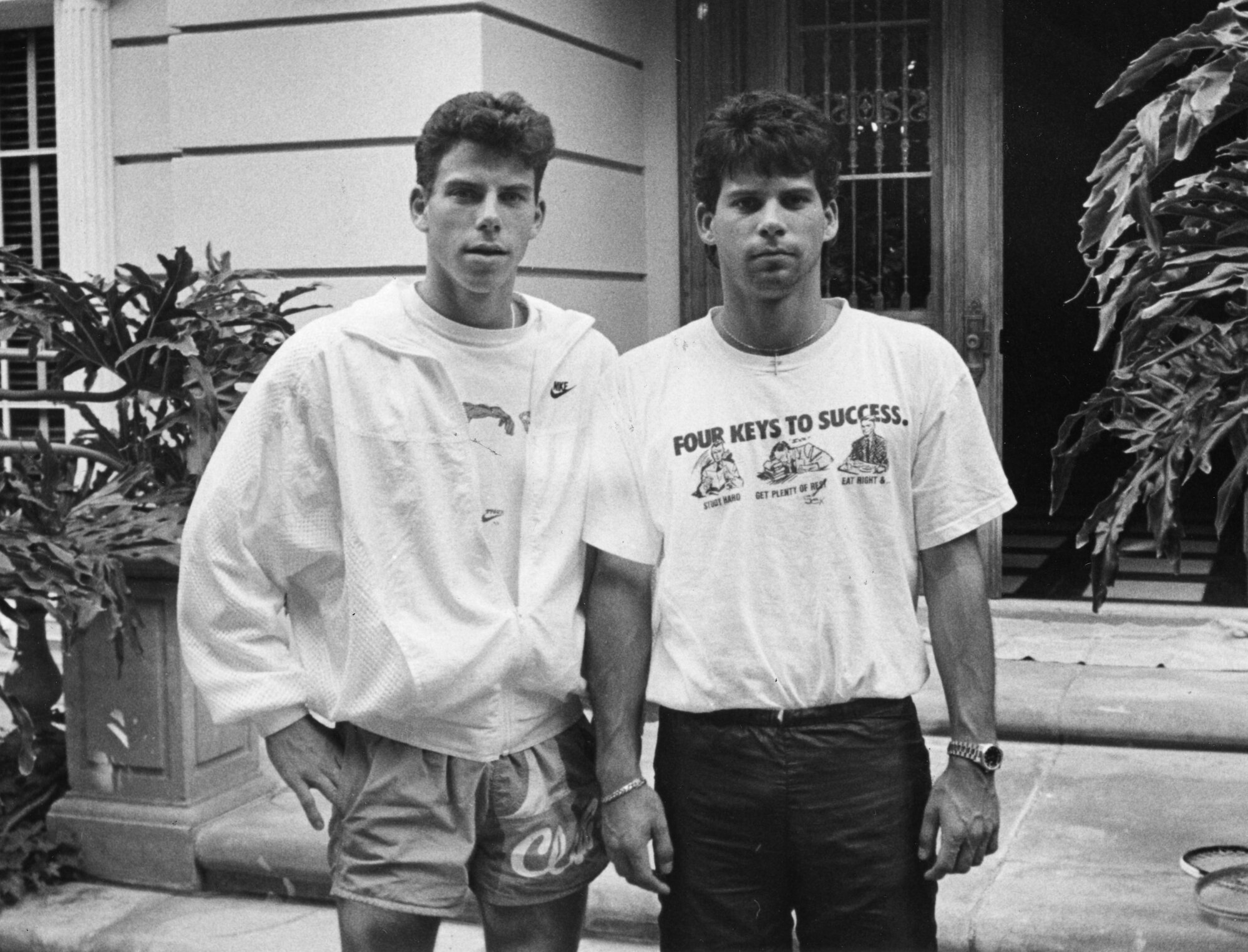 Erik Menendez, left, and his brother Lyle, in front of their Beverly Hills home.