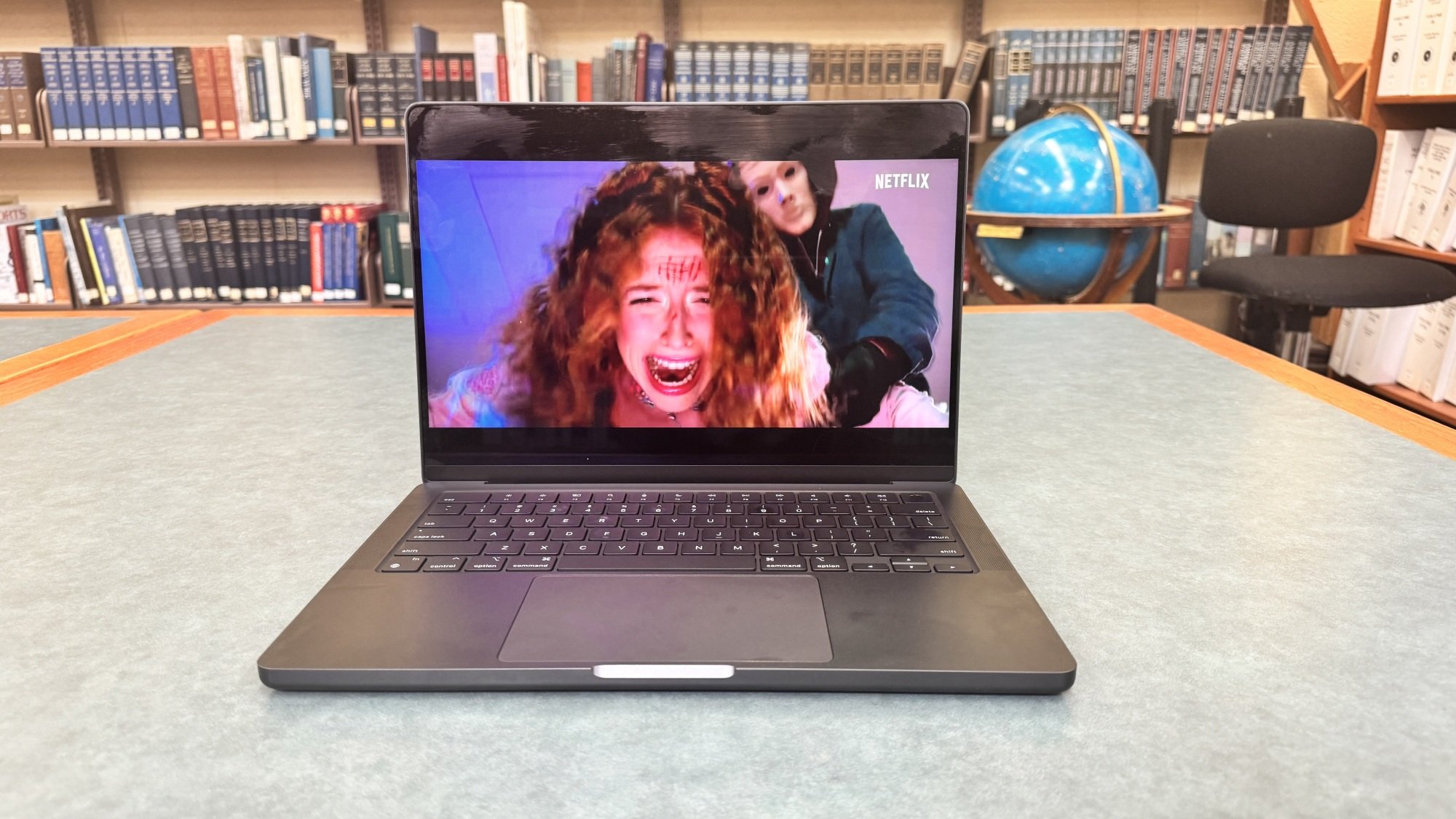 Apple MacBook Pro (14-inch, M4) with lid closed on a table